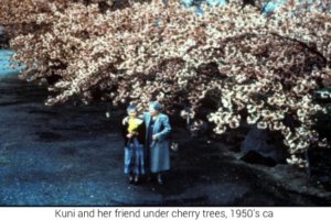 1950sca-Kuni and her friend under cherry trees